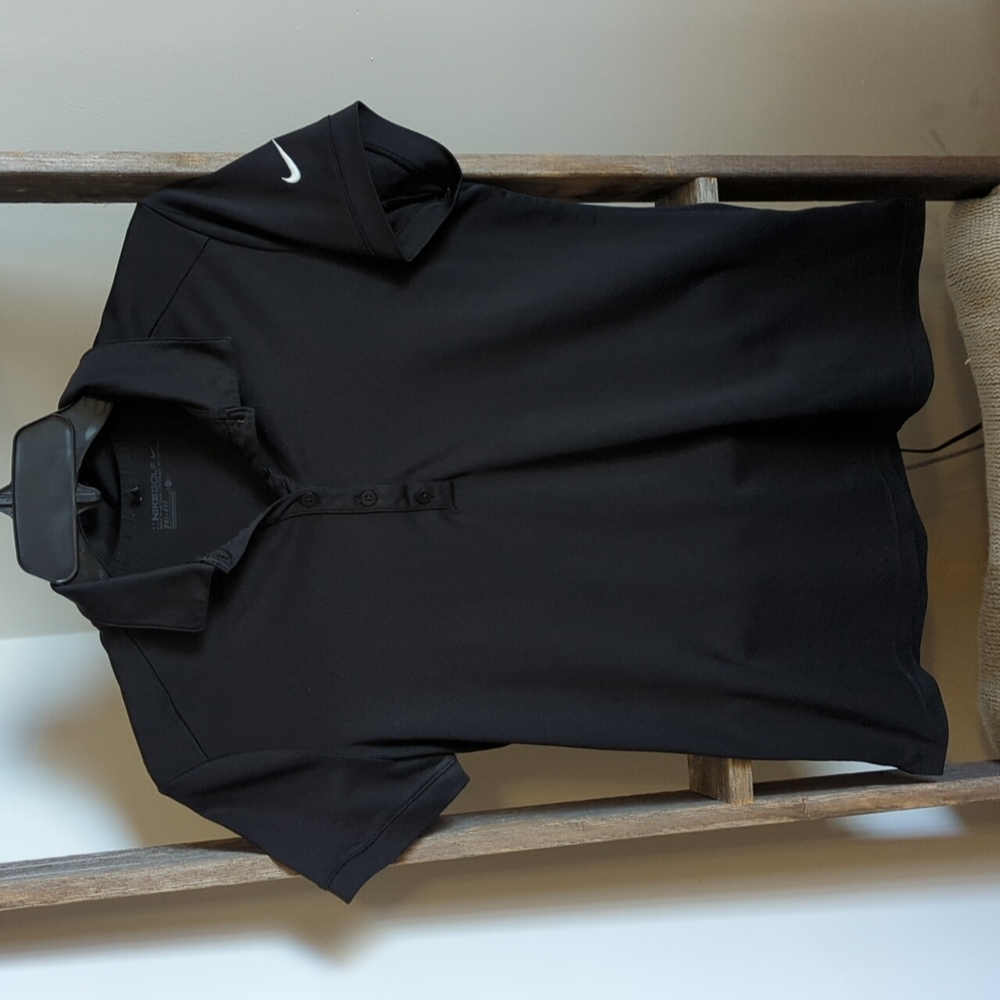 NikeGolf Women's Dri-Fit Polo. Black size large fits like medium.